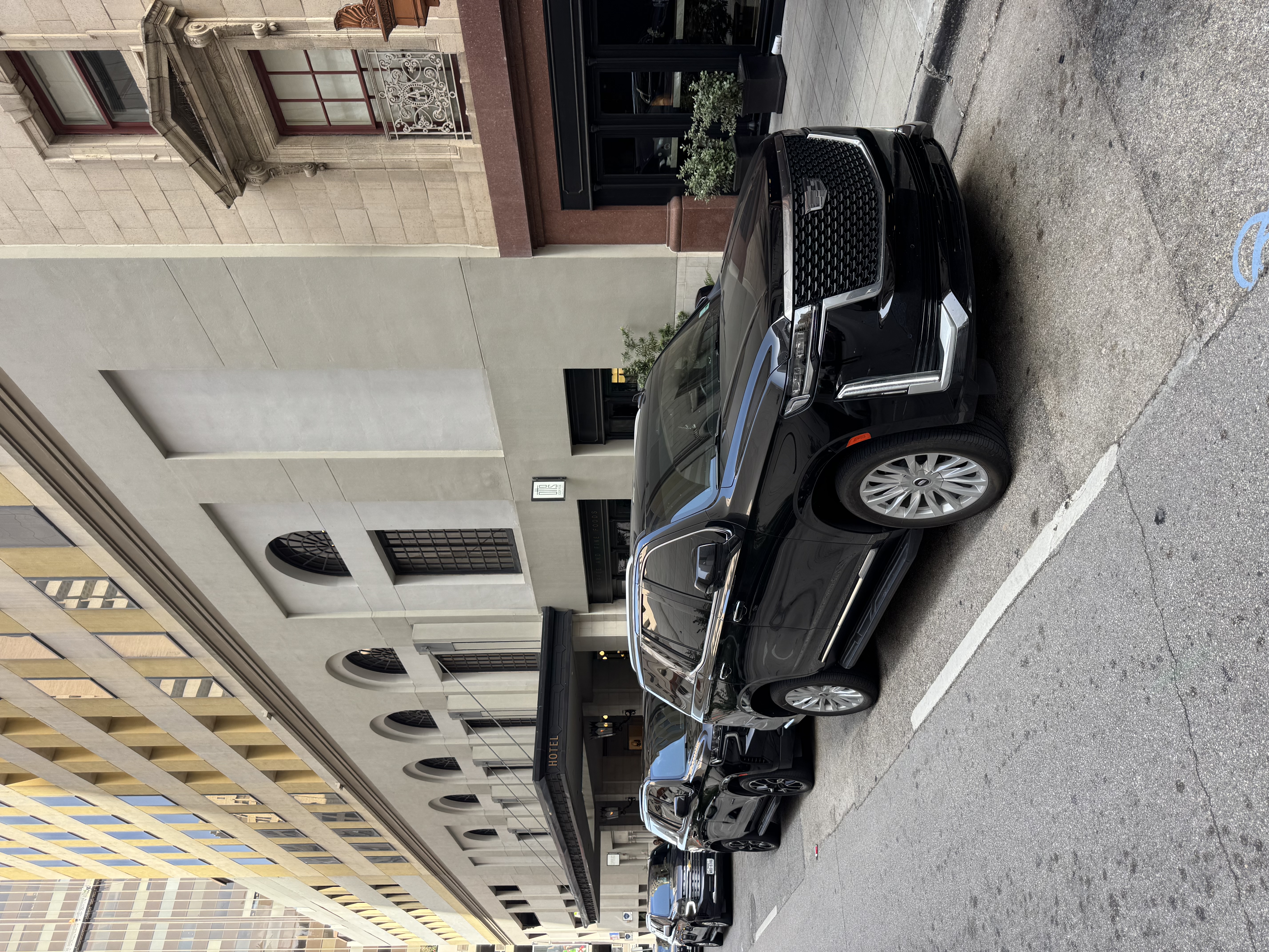 Cadillac Escalade at a downtown hotel